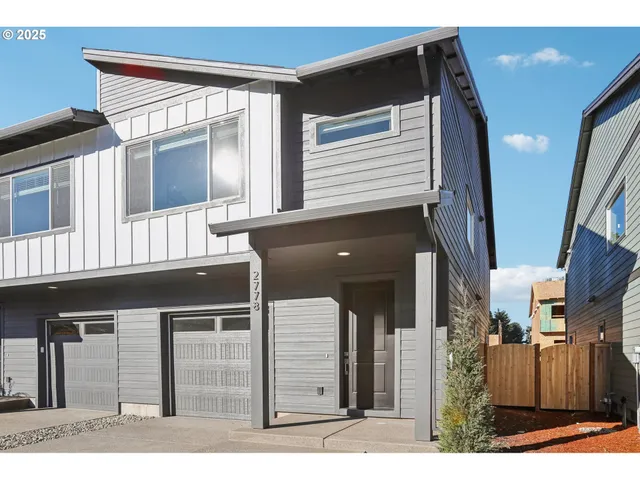 a black and white photo of a living room