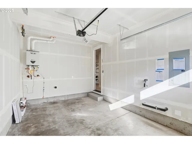 a view of a backyard with wooden fence