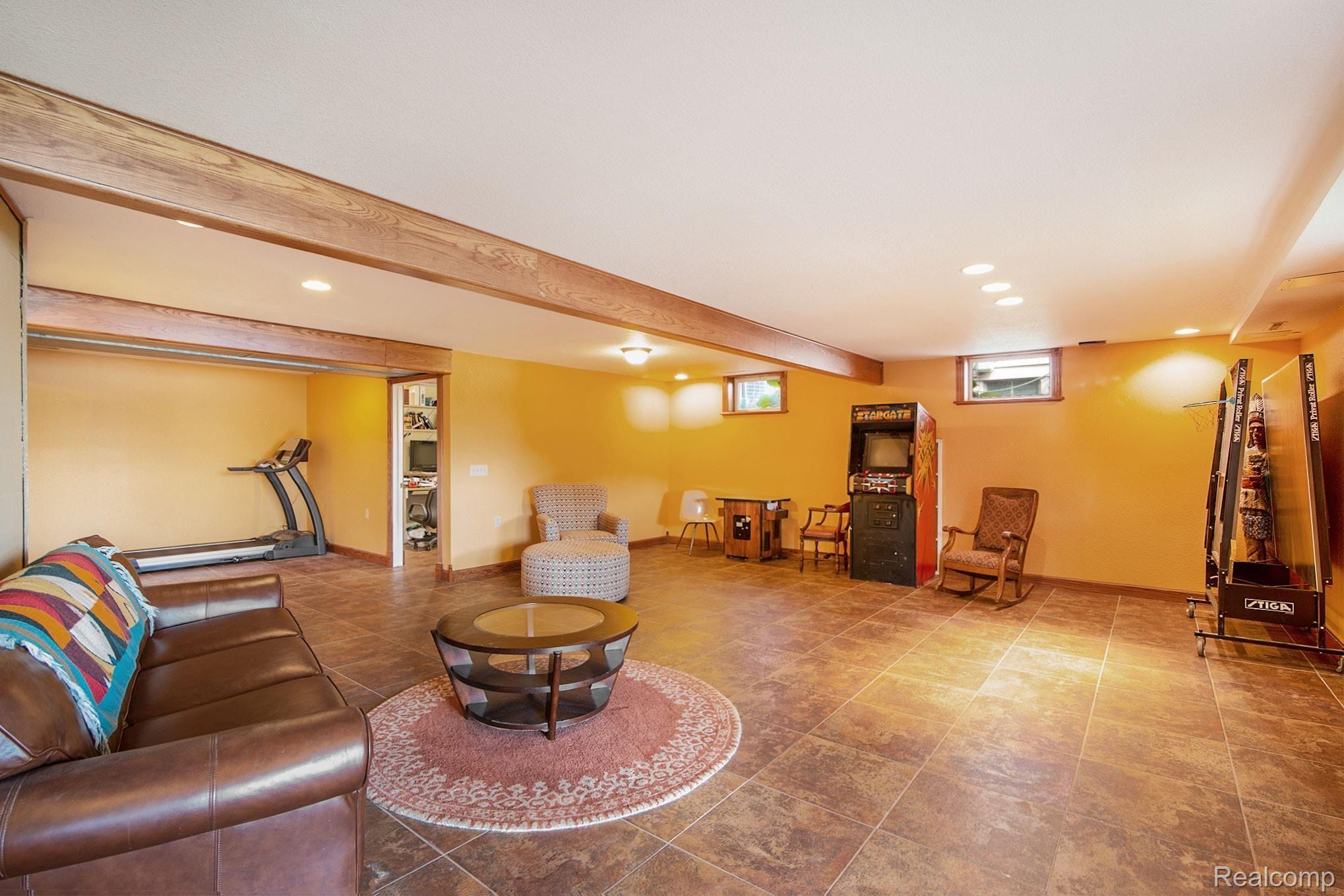 1231 Crooked Lake Road Fenton, MI 48430 - Photo 34 of 48 Huge finished lower level, ceramic flooring.jpg