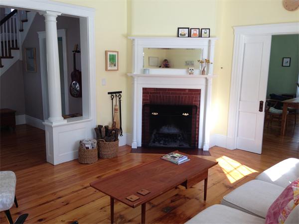 149 Market Street Amesbury, MA 01913 - Photo 16 of 23 a living room with furniture and a fireplace
