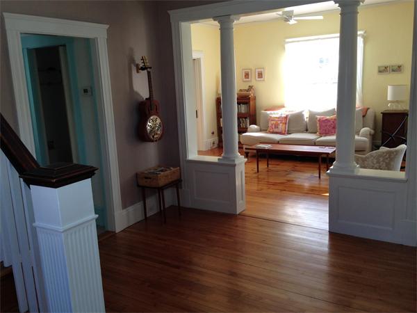 149 Market Street Amesbury, MA 01913 - Photo 4 of 23 a living room with furniture and a wooden floor