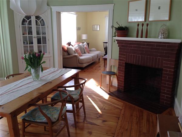 149 Market Street Amesbury, MA 01913 - Photo 5 of 23 a living room with furniture a fireplace and potted plants