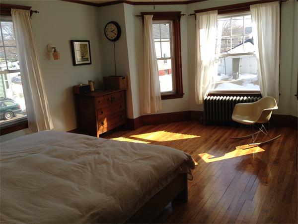 149 Market Street Amesbury, MA 01913 - Photo 8 of 23 a bedroom with a bed and a window