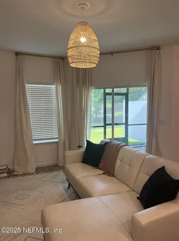 a room with furniture and a rug