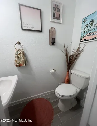 a view of a street with a building in the background