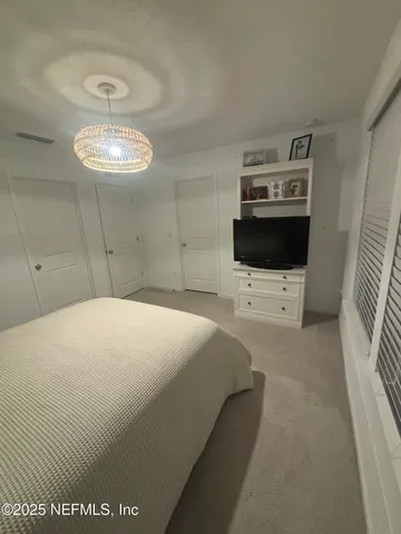 a bathroom with a shower and a toilet