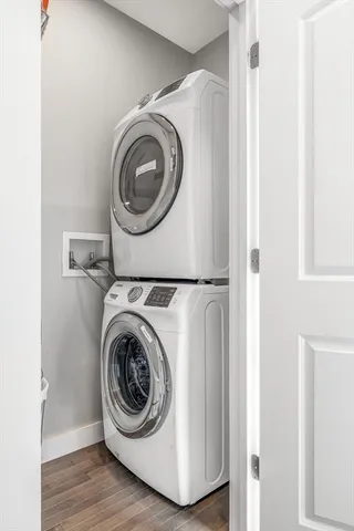 a bathroom with a toilet sink and shower