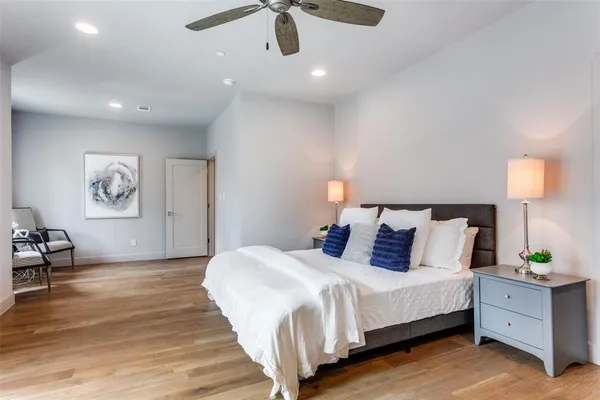 a bedroom with bed and window