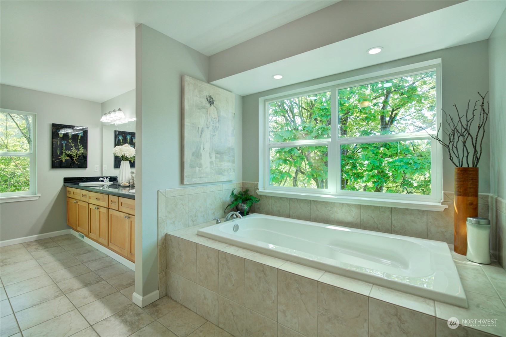 3649 22nd Avenue Southwest Seattle, WA 98106 - Photo 20 of 40 a spacious bathroom with a large tub sink and mirror