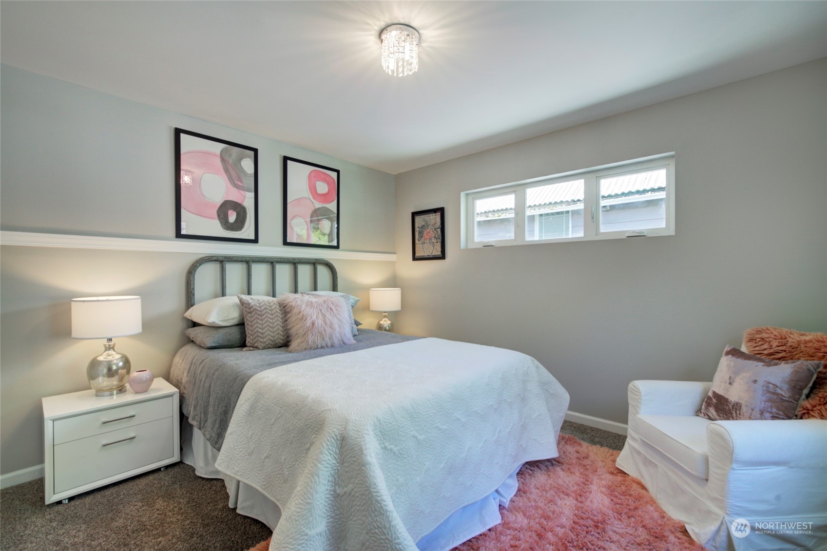 3649 22nd Avenue Southwest Seattle, WA 98106 - Photo 22 of 40 a bedroom with a bed and a couch