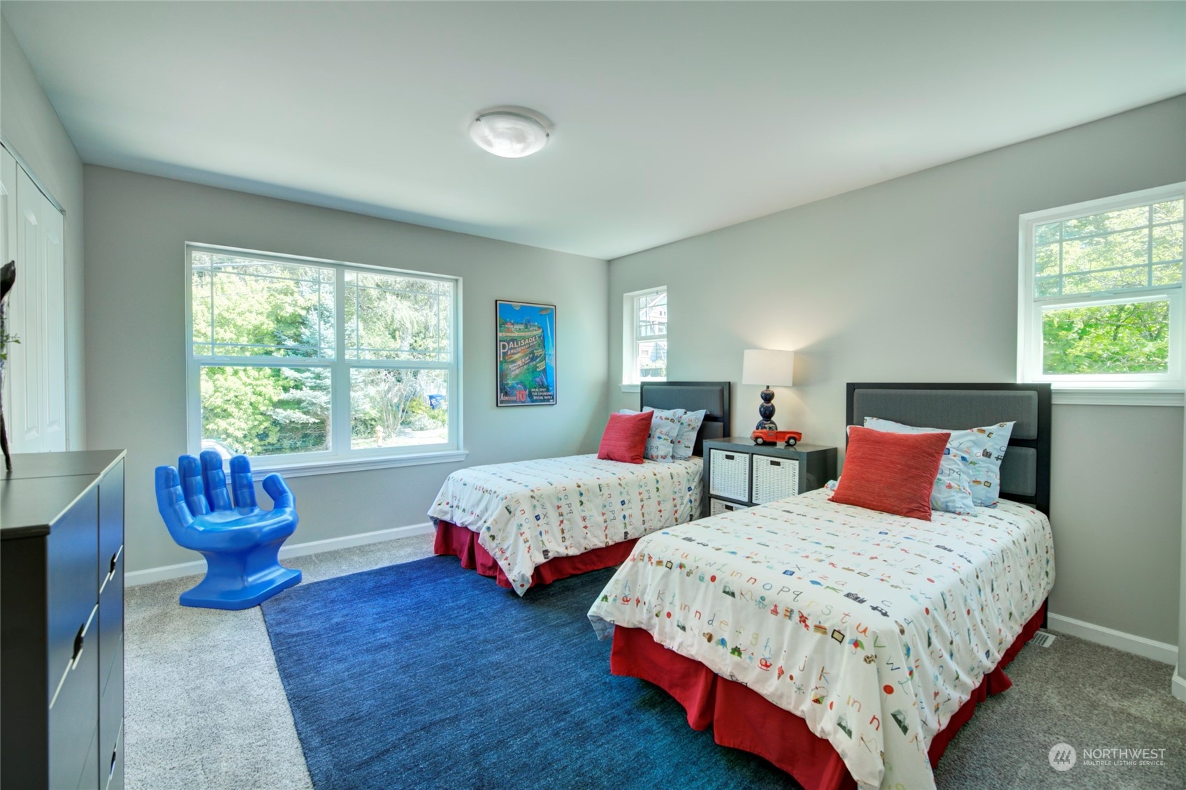 3649 22nd Avenue Southwest Seattle, WA 98106 - Photo 24 of 40 a bedroom with two beds and windows
