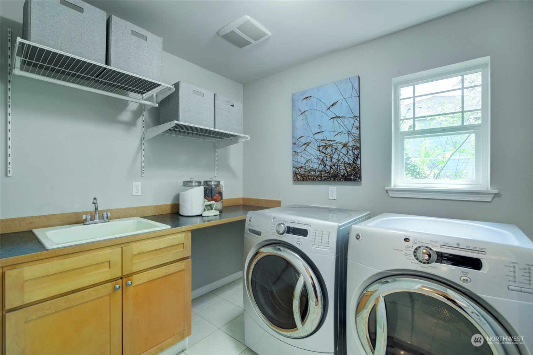 3649 22nd Avenue Southwest Seattle, WA 98106 - Photo 27 of 40 a utility room with dryer and washer