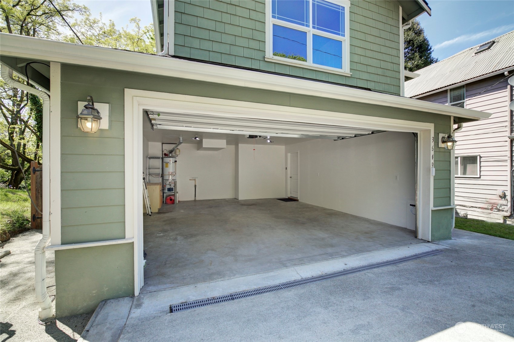 3649 22nd Avenue Southwest Seattle, WA 98106 - Photo 38 of 40 a view of a house with a garage