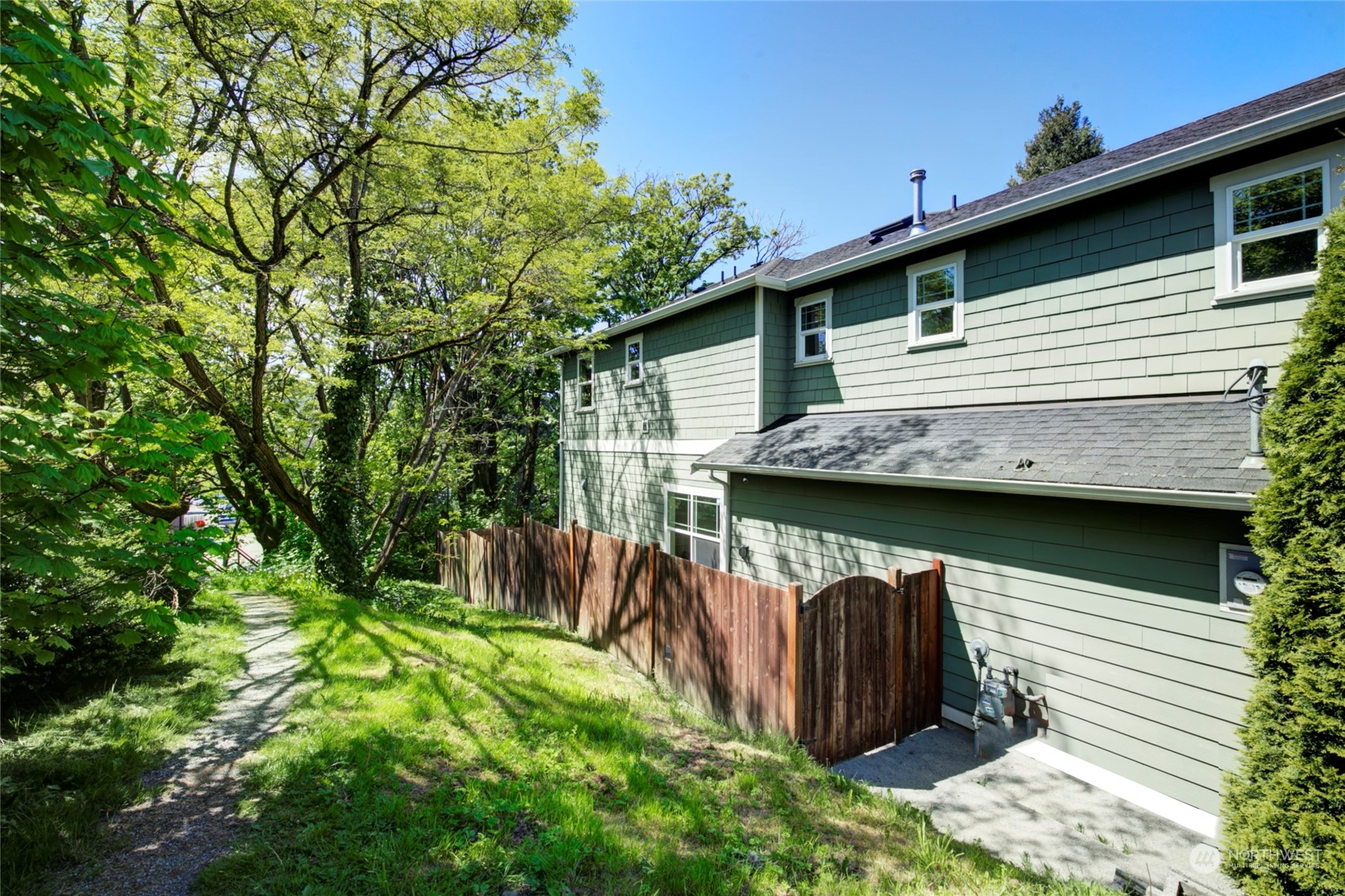 3649 22nd Avenue Southwest Seattle, WA 98106 - Photo 40 of 40 a view of a house with a backyard