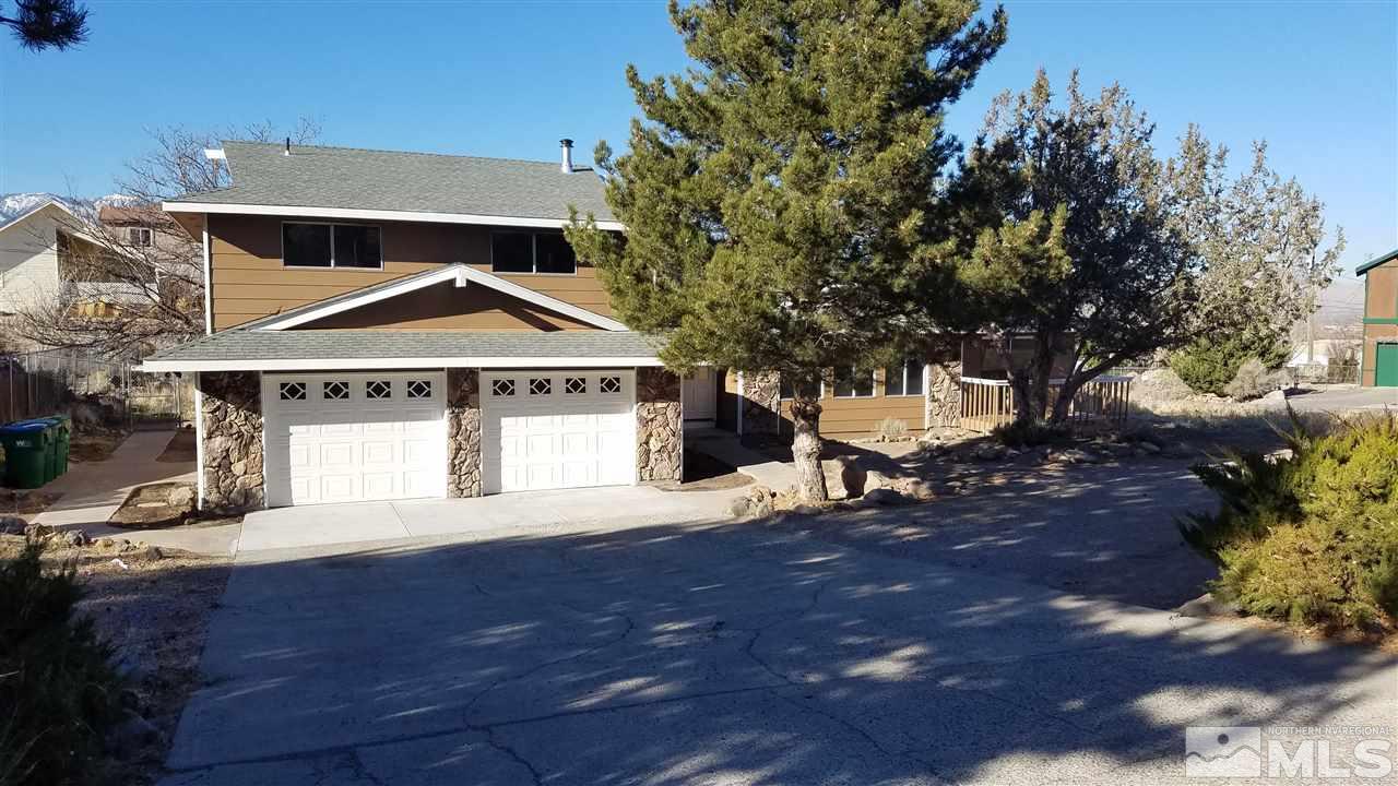 14015 Chamy Drive Reno, NV 89521 - Photo 1 of 1 a front view of a house with a yard
