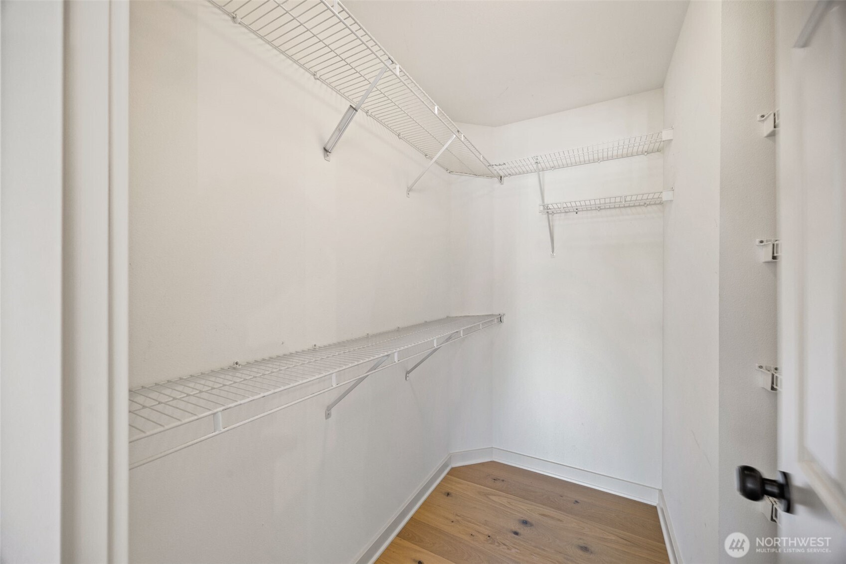 2613 East Howell Street Seattle, WA 98122 - Photo 14 of 31 a view of a room with racks on the wall