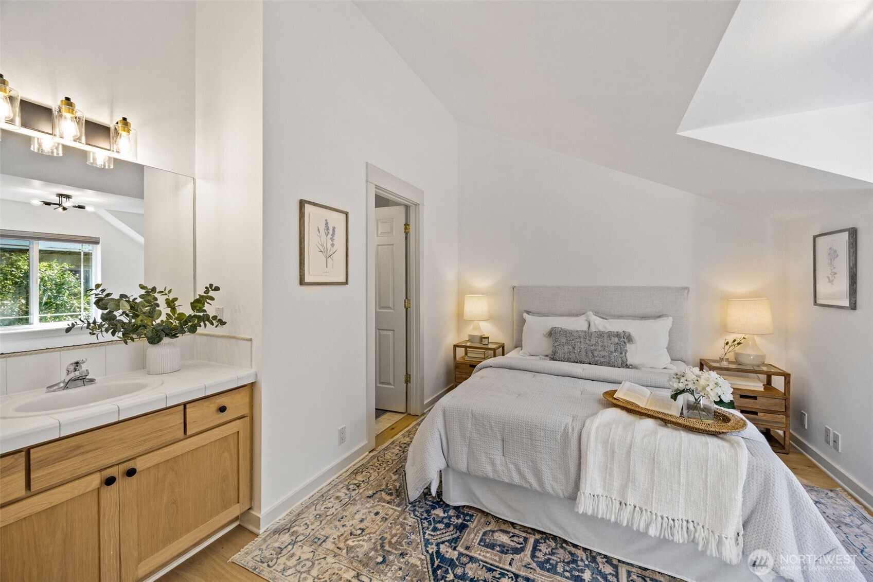 2613 East Howell Street Seattle, WA 98122 - Photo 15 of 31 a bedroom with a bed and a sink