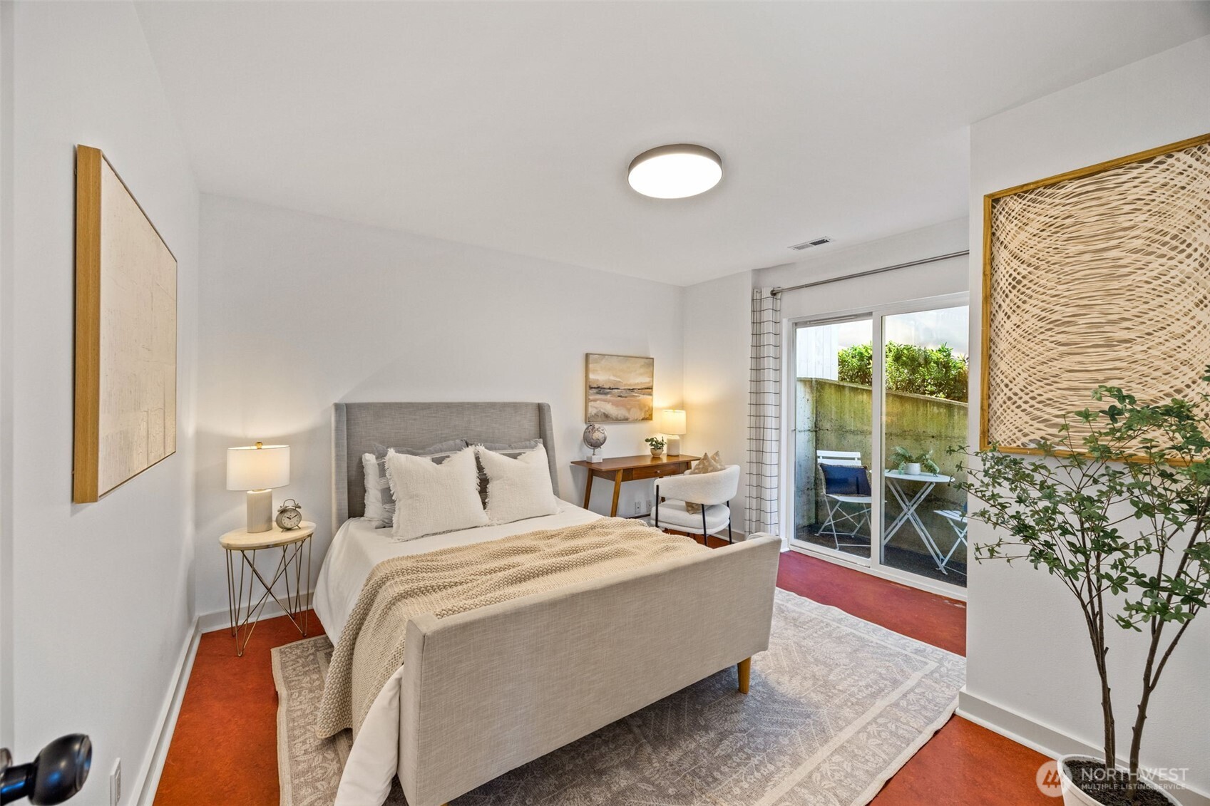 2613 East Howell Street Seattle, WA 98122 - Photo 18 of 31 a bedroom with a bed and a large window