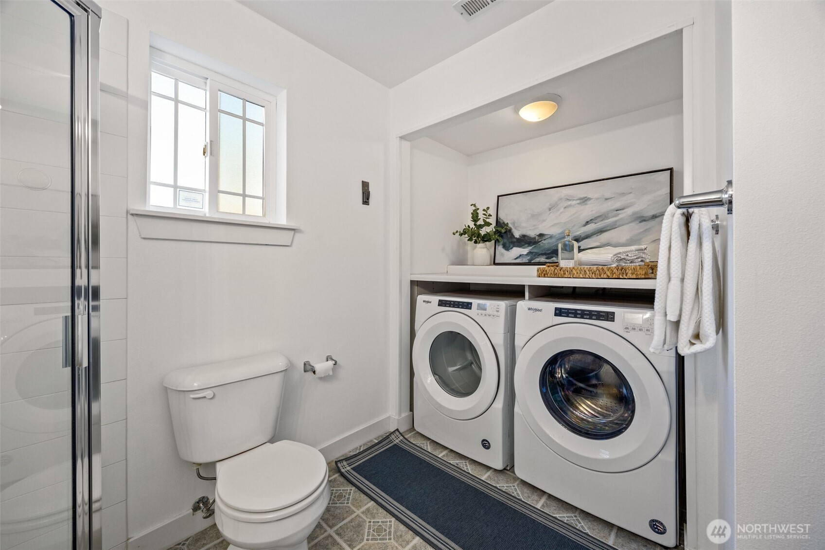 2613 East Howell Street Seattle, WA 98122 - Photo 20 of 31 a white toilet sitting next to a window