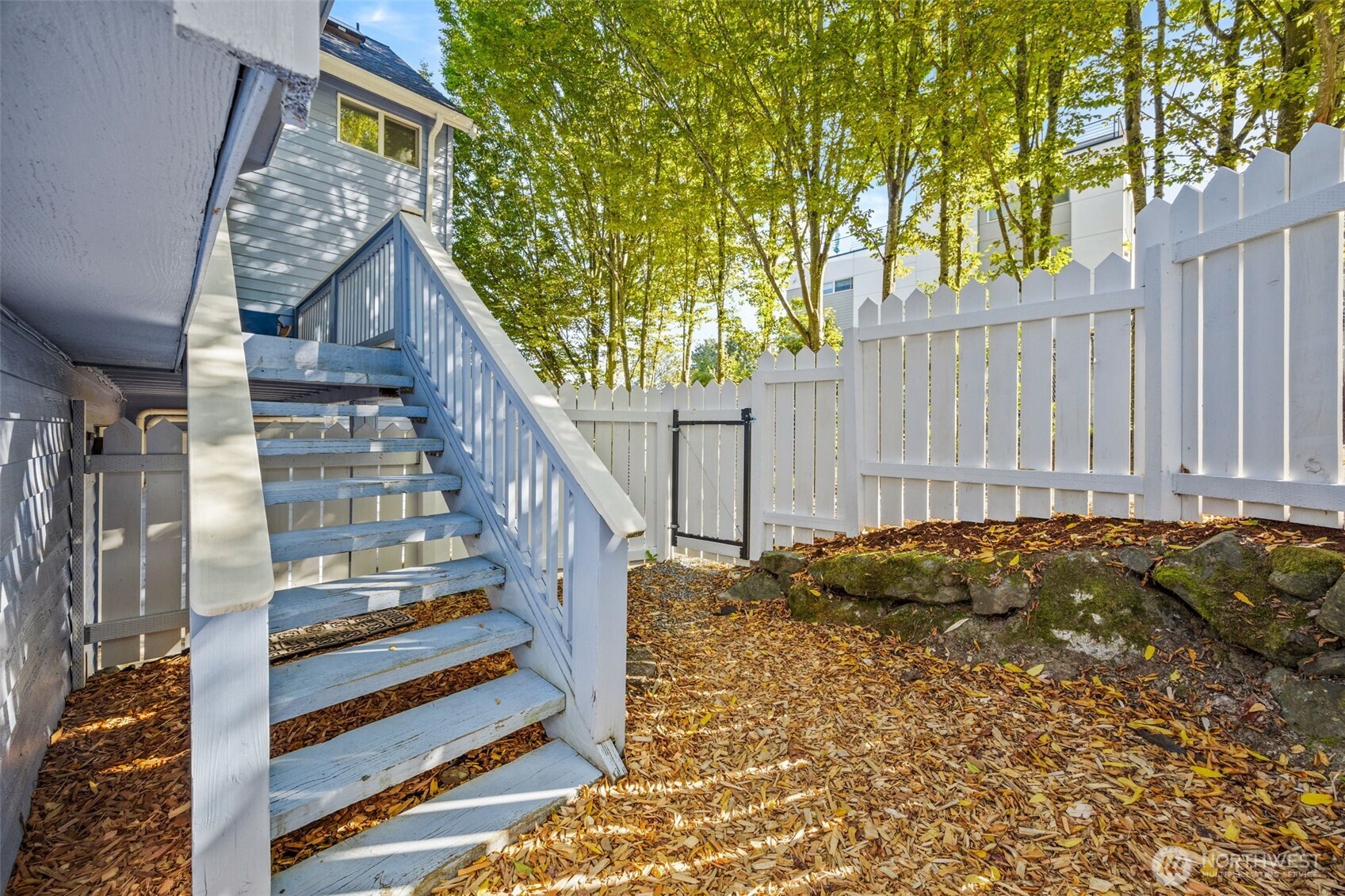 2613 East Howell Street Seattle, WA 98122 - Photo 22 of 31 a view of entryway with wooden stairs