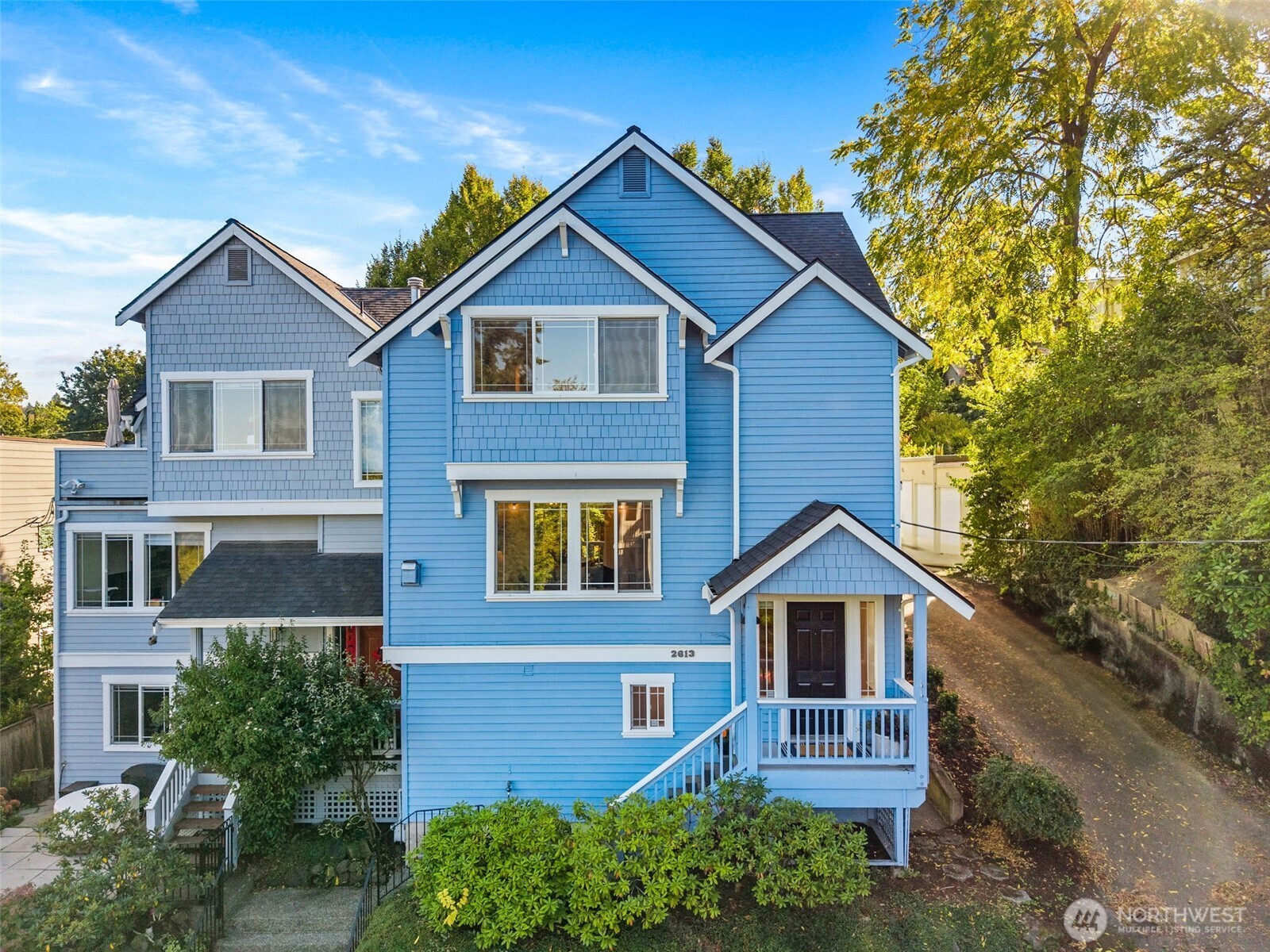 2613 East Howell Street Seattle, WA 98122 - Photo 24 of 31 a front view of a house with a yard
