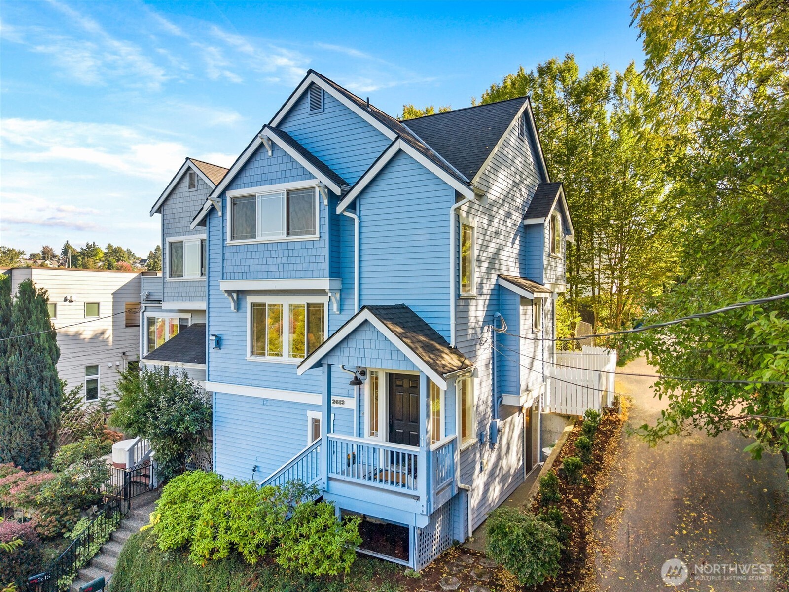 2613 East Howell Street Seattle, WA 98122 - Photo 25 of 31 a front view of a house with a garden