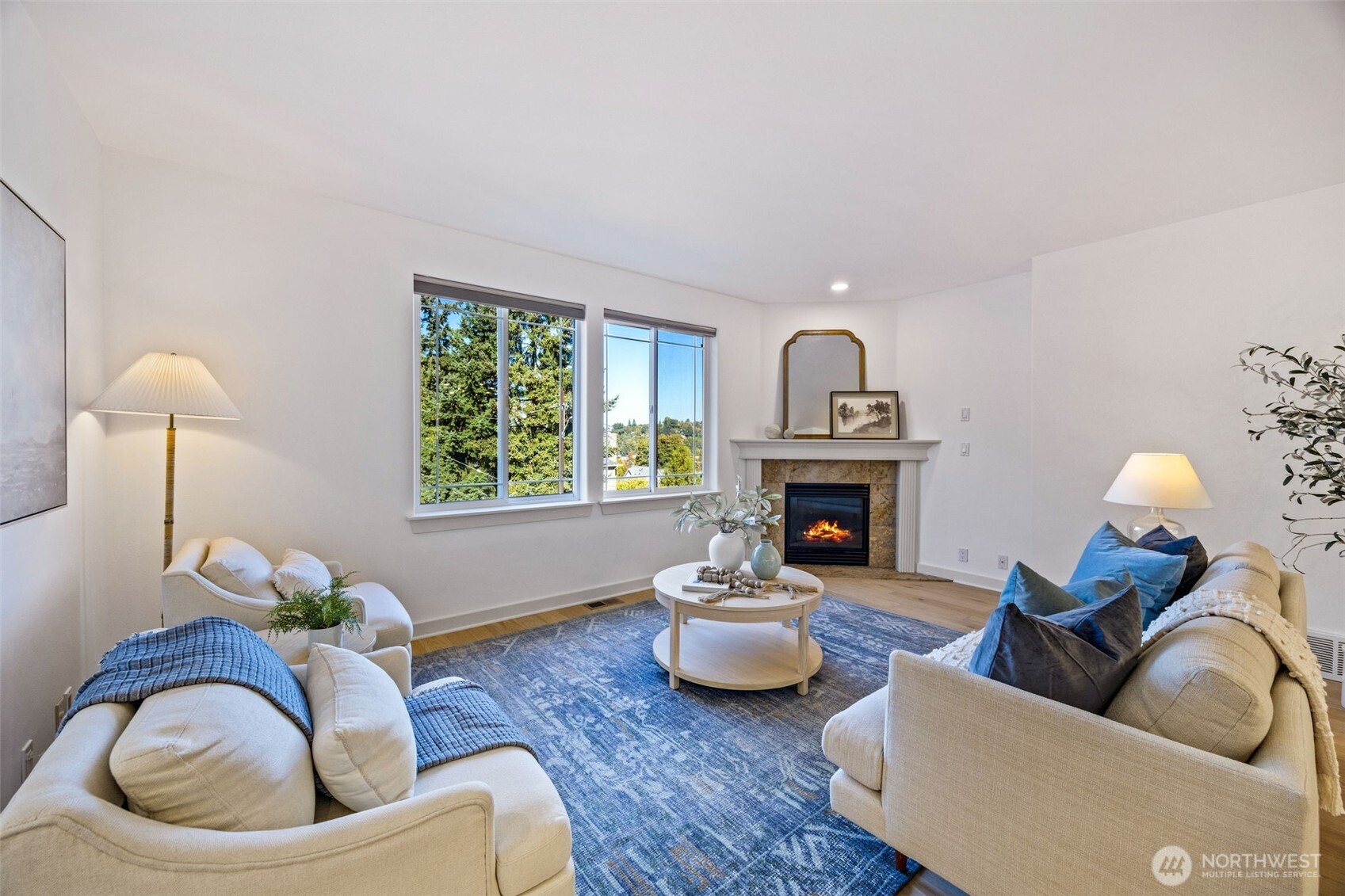 2613 East Howell Street Seattle, WA 98122 - Photo 3 of 31 a living room with furniture and a fireplace