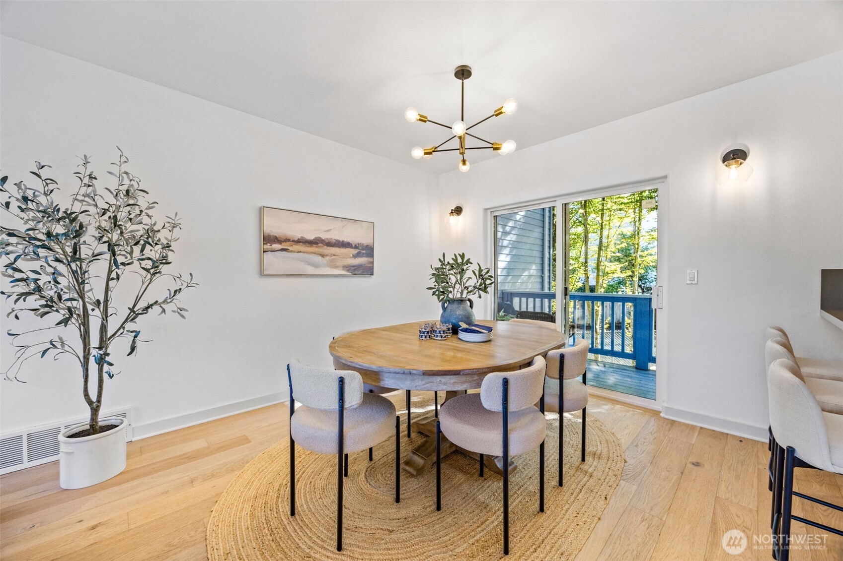 2613 East Howell Street Seattle, WA 98122 - Photo 5 of 31 a view of a dining room with furniture and a potted plant