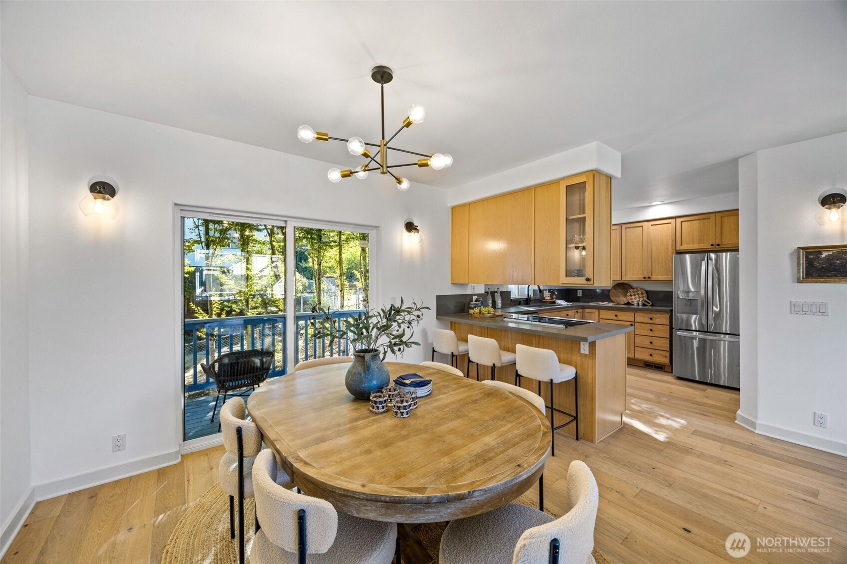 2613 East Howell Street Seattle, WA 98122 - Photo 6 of 31 a view of a dining room with furniture window and wooden floor