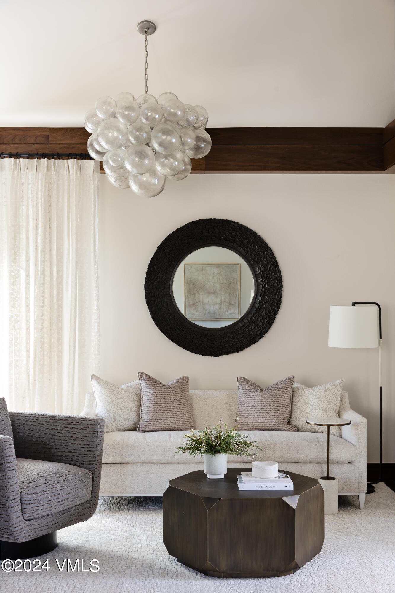 107 Rockledge Road Vail, CO 81657 - Photo 36 of 65 a living room with furniture and a chandelier