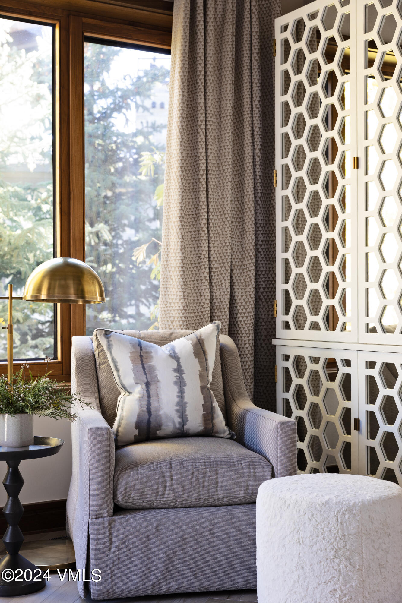 107 Rockledge Road Vail, CO 81657 - Photo 39 of 65 a living room with furniture and a large window