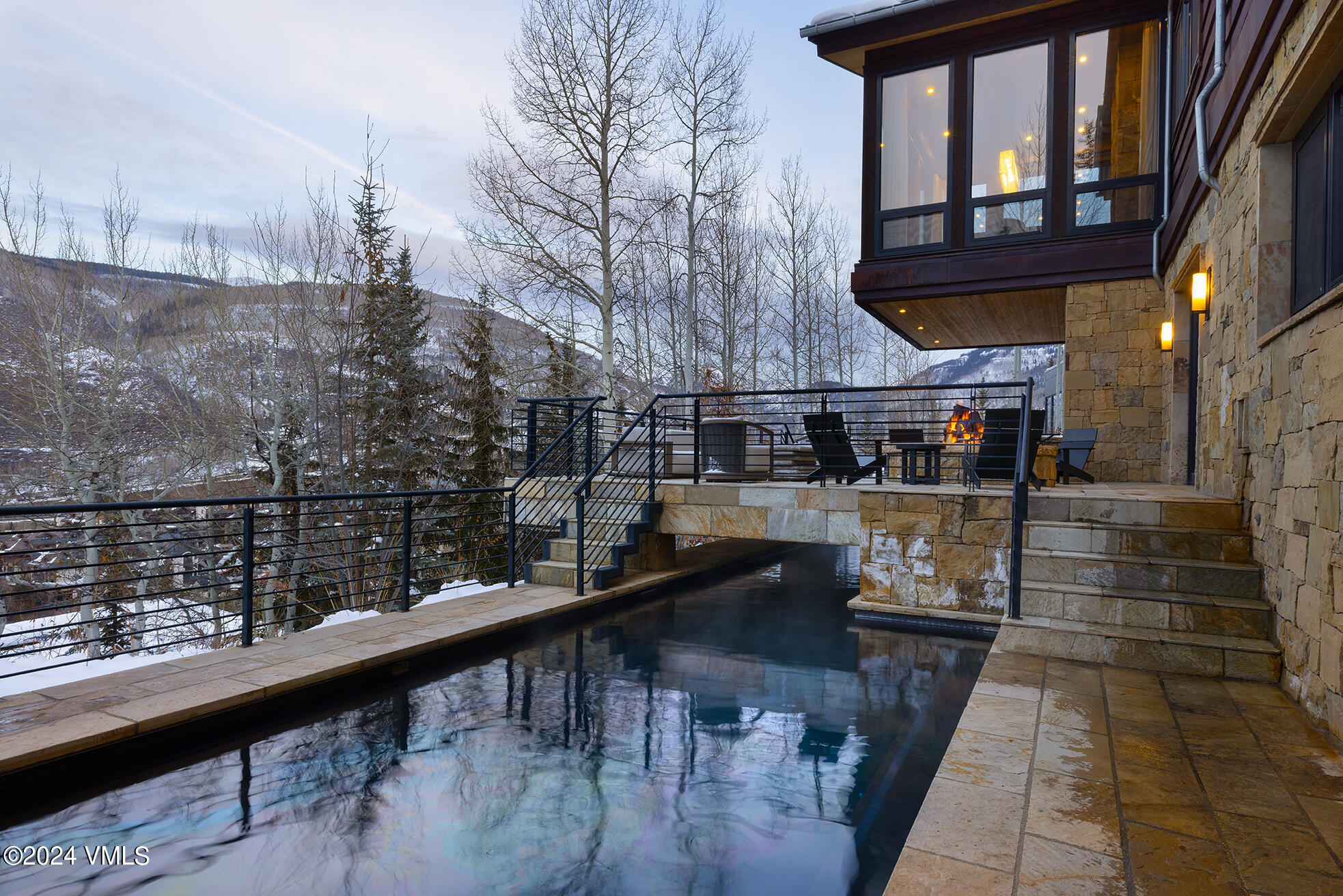 107 Rockledge Road Vail, CO 81657 - Photo 58 of 65 a view of swimming pool with seating area