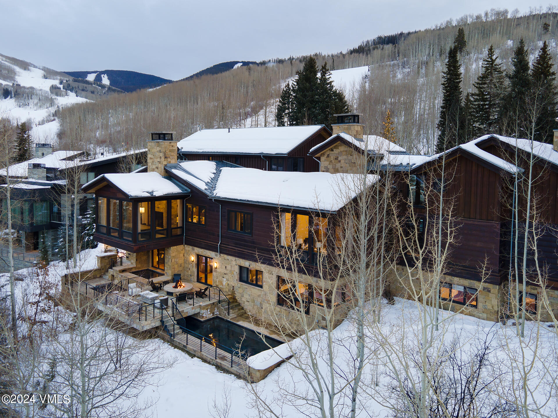 107 Rockledge Road Vail, CO 81657 - Photo 60 of 65 a view of a house with backyard and sitting area