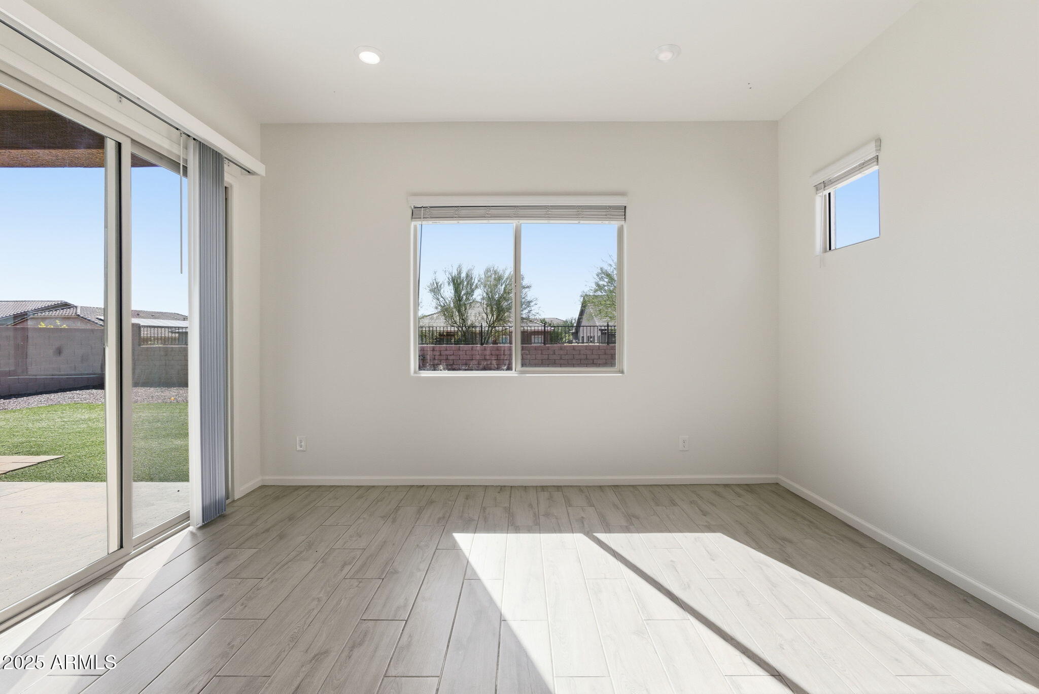 18545 West Chuckwalla Canyon Road Goodyear, AZ 85338 - Photo 8 of 26 an empty room with a window