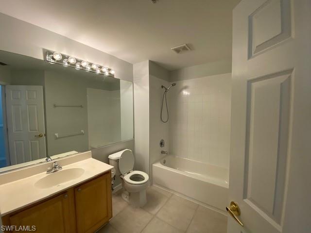 839 Hampton Circle, Unit 149 Naples, FL 34105 - Photo 16 of 32 a bathroom with a sink mirror toilet and bathtub