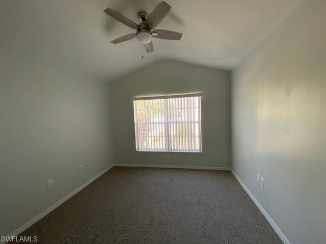 839 Hampton Circle, Unit 149 Naples, FL 34105 - Photo 17 of 32 an empty room with a window and a fan
