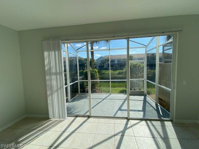 839 Hampton Circle, Unit 149 Naples, FL 34105 - Photo 20 of 32 a view of a garden from a windows room