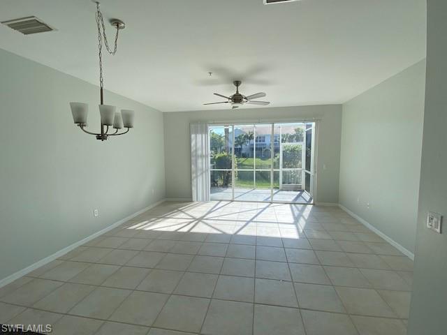 839 Hampton Circle, Unit 149 Naples, FL 34105 - Photo 5 of 32 a view of an empty room with a window
