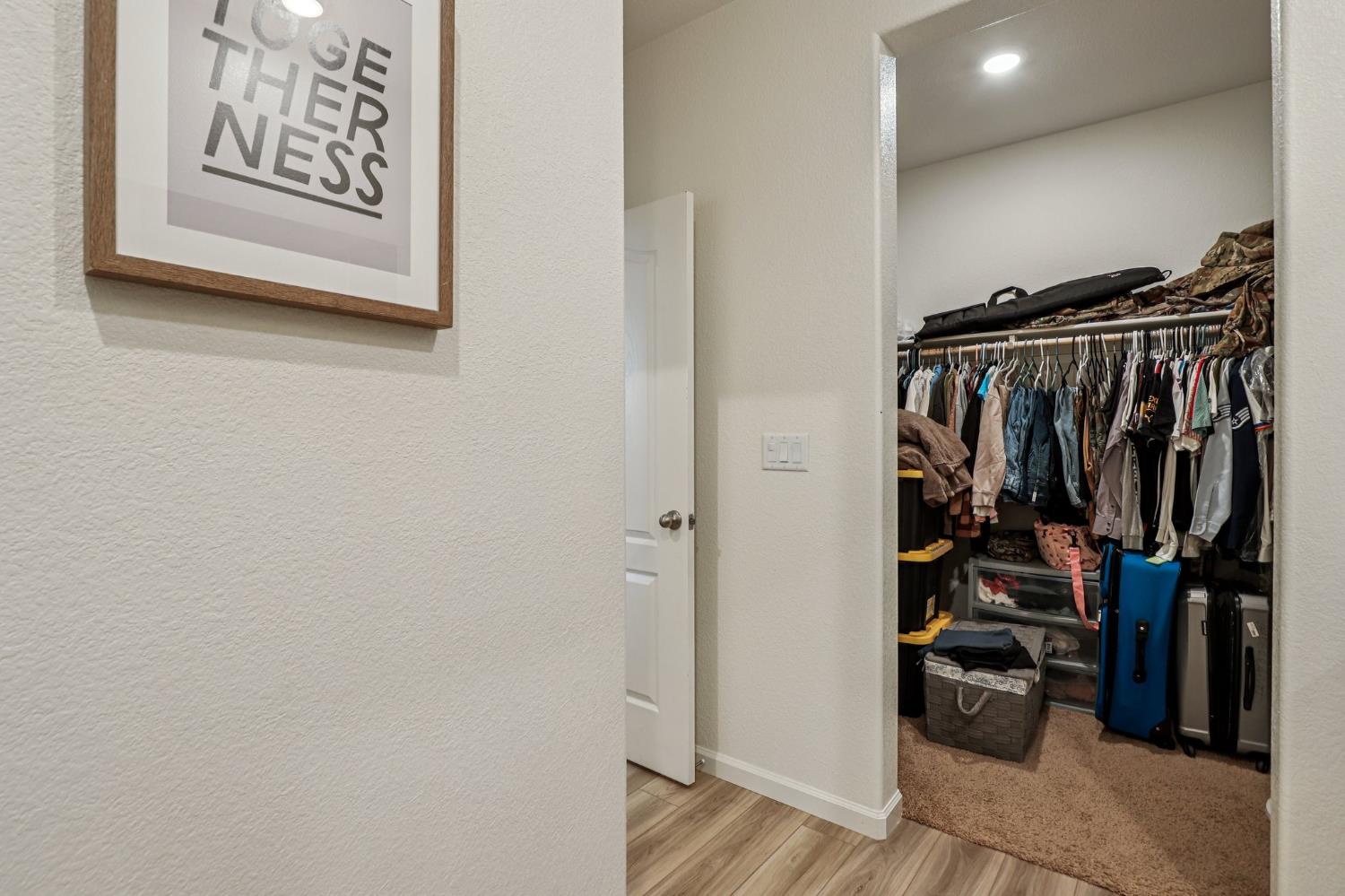 5626 Sunhaven Street Marysville, CA 95901 - Photo 19 of 31 a view of walk in closet with clothes and shoes