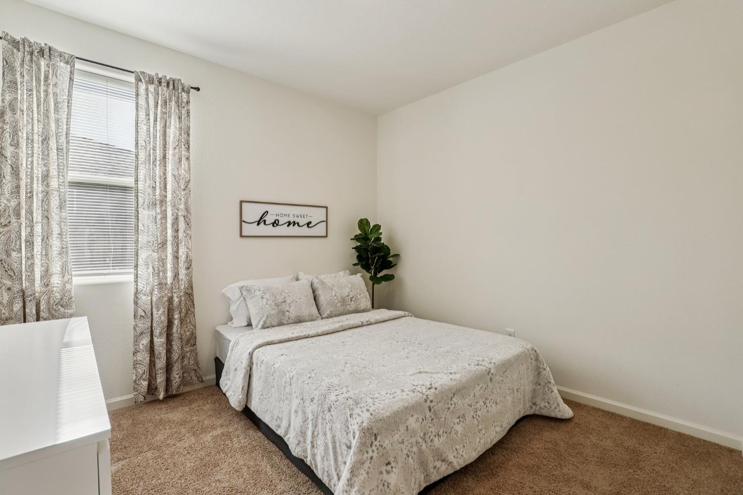 5626 Sunhaven Street Marysville, CA 95901 - Photo 20 of 31 a bedroom with a bed and a window