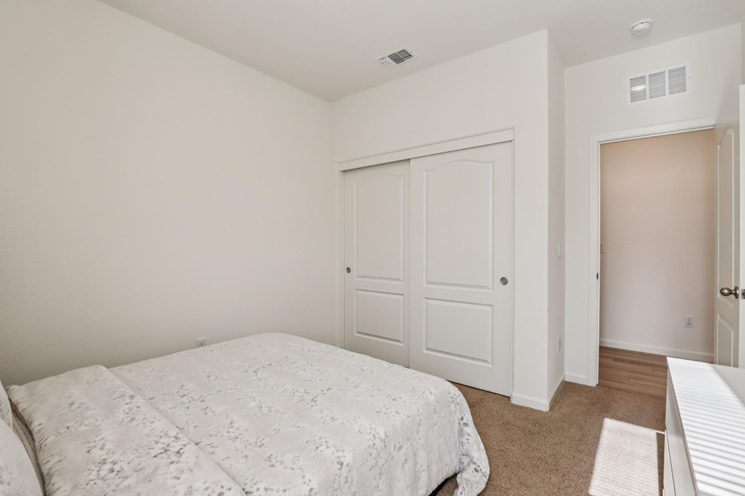 5626 Sunhaven Street Marysville, CA 95901 - Photo 21 of 31 a bedroom with a bed and a rug