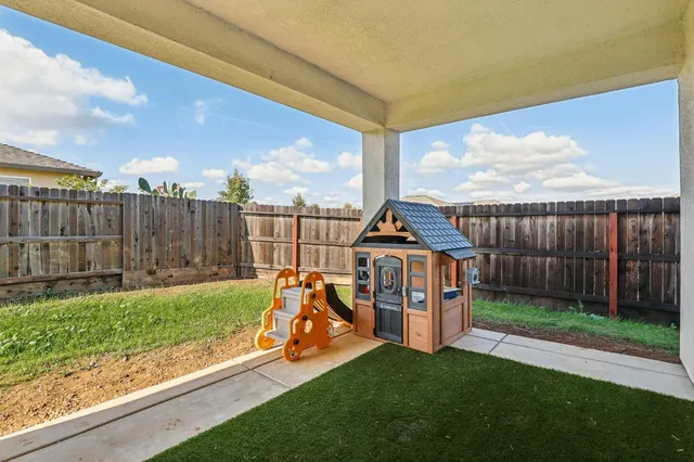 a view of a garden with a slide