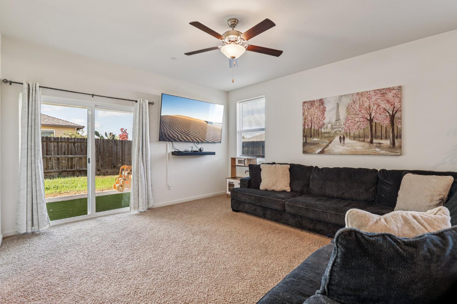 5626 Sunhaven Street Marysville, CA 95901 - Photo 4 of 31 a living room with furniture and a floor to ceiling window