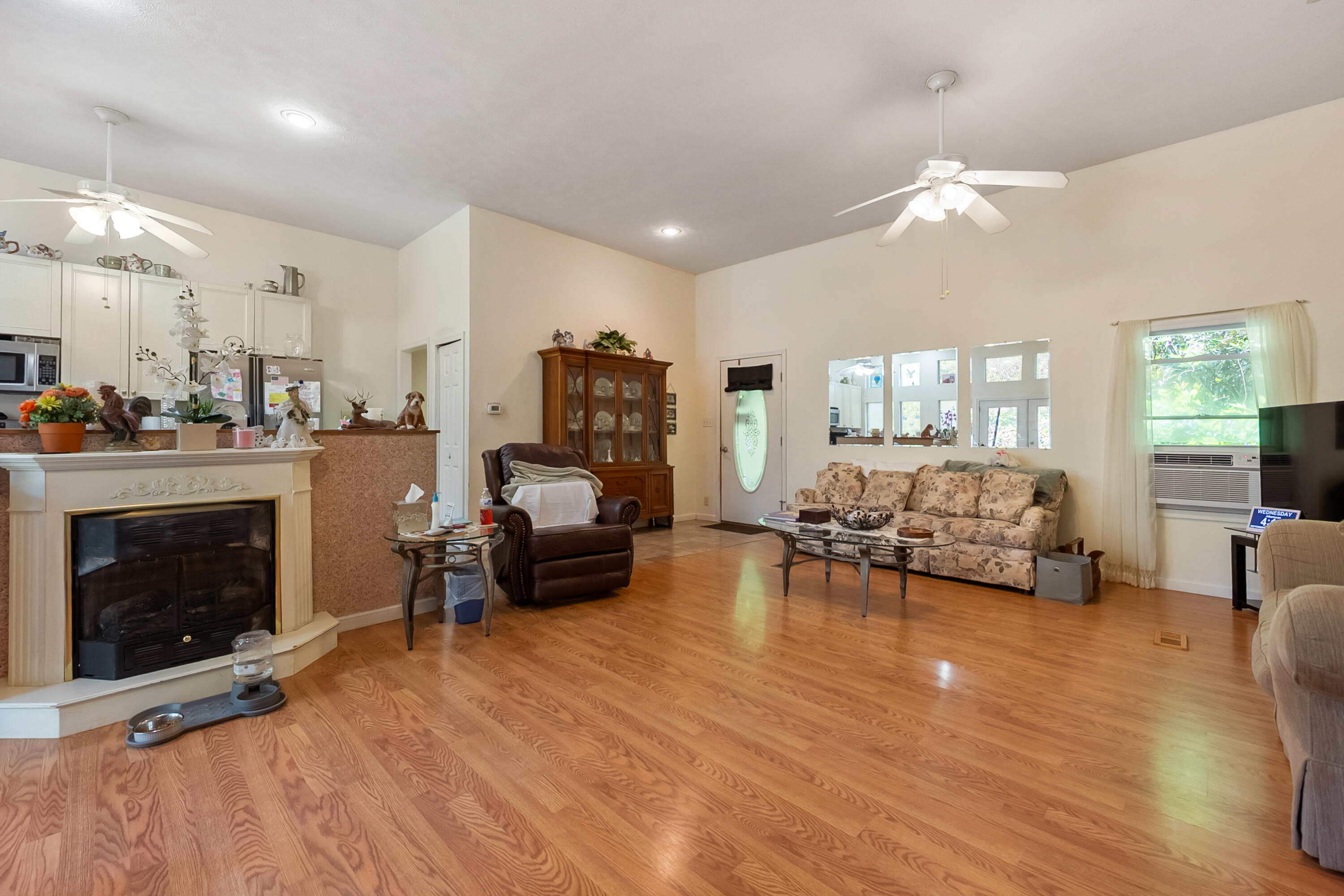 6286 Chestnut Ridge Road Riner, VA 24149 - Photo 14 of 102 a living room with furniture and a fireplace