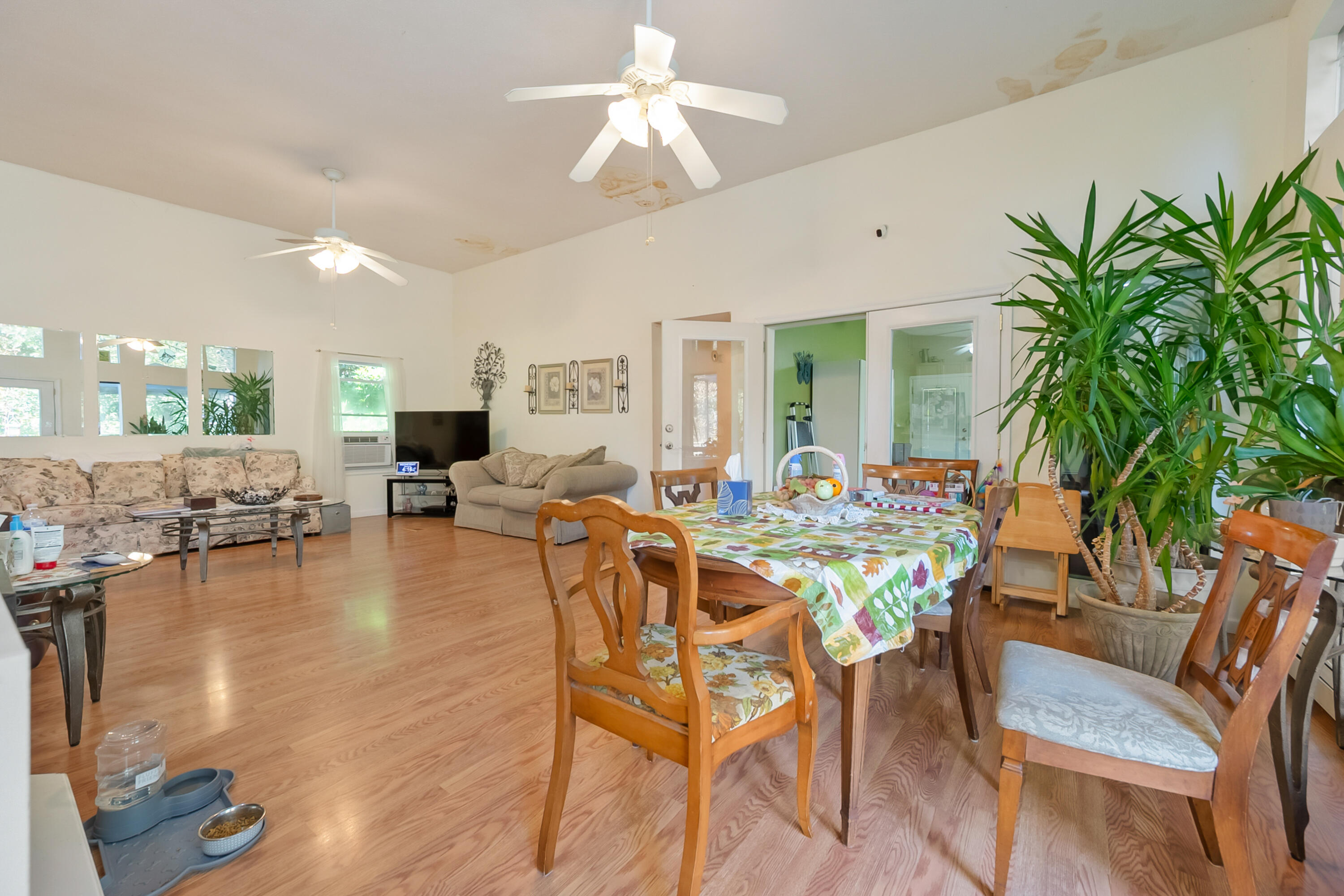 6286 Chestnut Ridge Road Riner, VA 24149 - Photo 15 of 102 a view of a dining room with furniture window and wooden floor