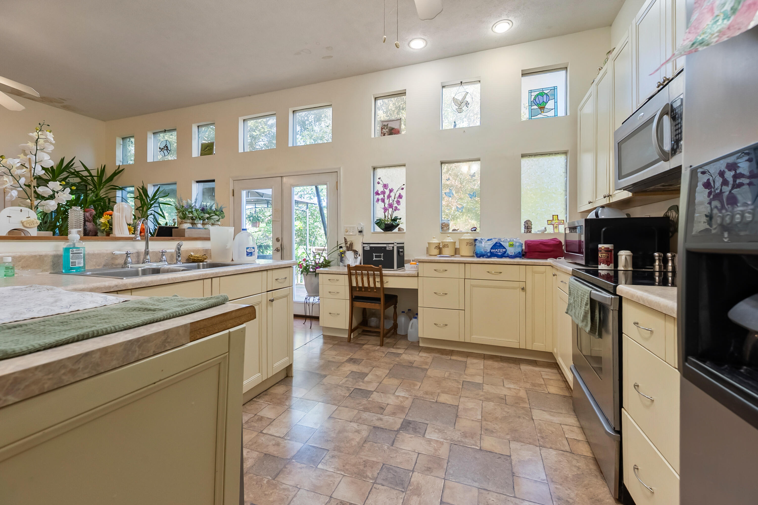 6286 Chestnut Ridge Road Riner, VA 24149 - Photo 20 of 102 a kitchen with a sink stove and cabinets