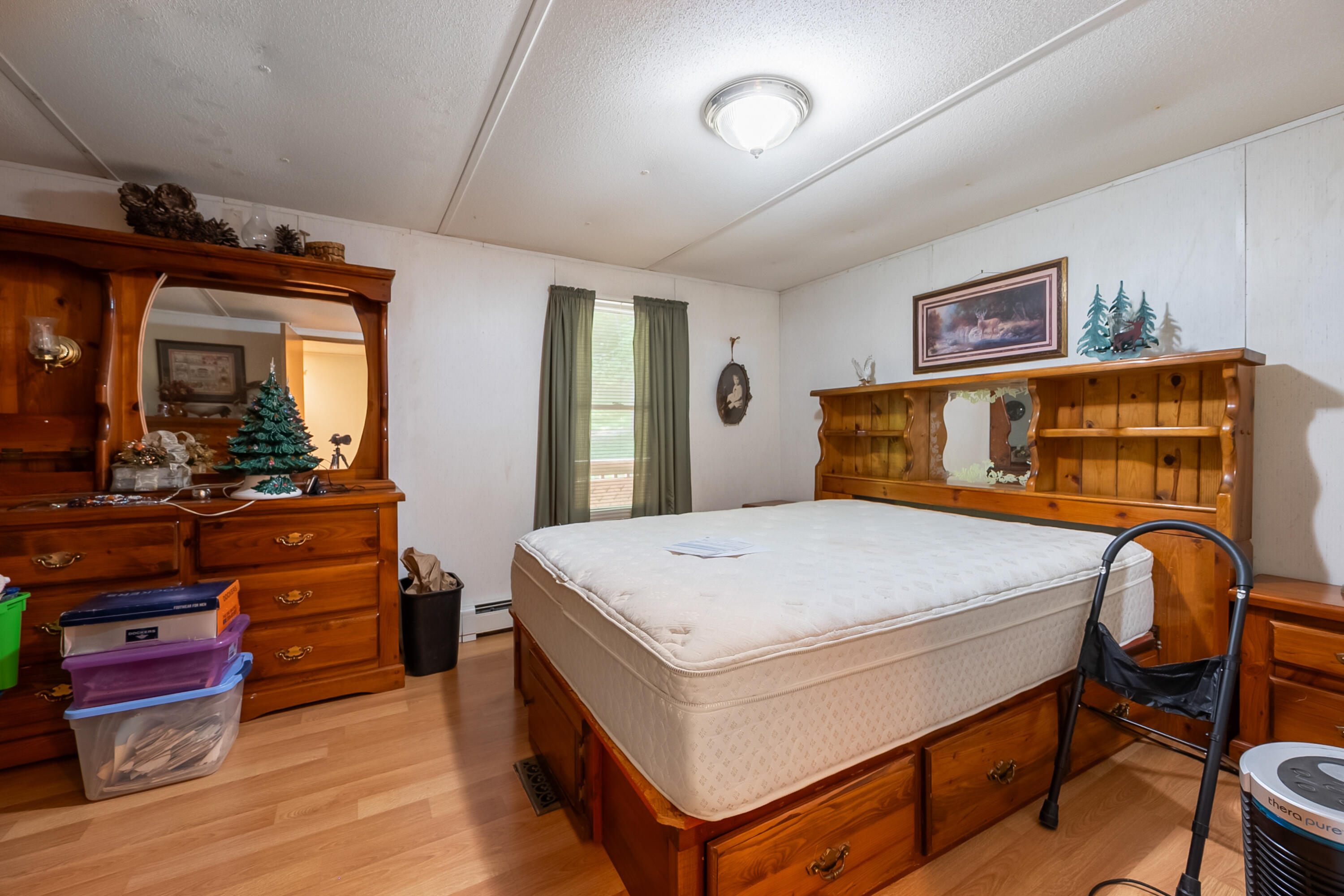 6286 Chestnut Ridge Road Riner, VA 24149 - Photo 36 of 102 a bedroom with a bed and a dresser