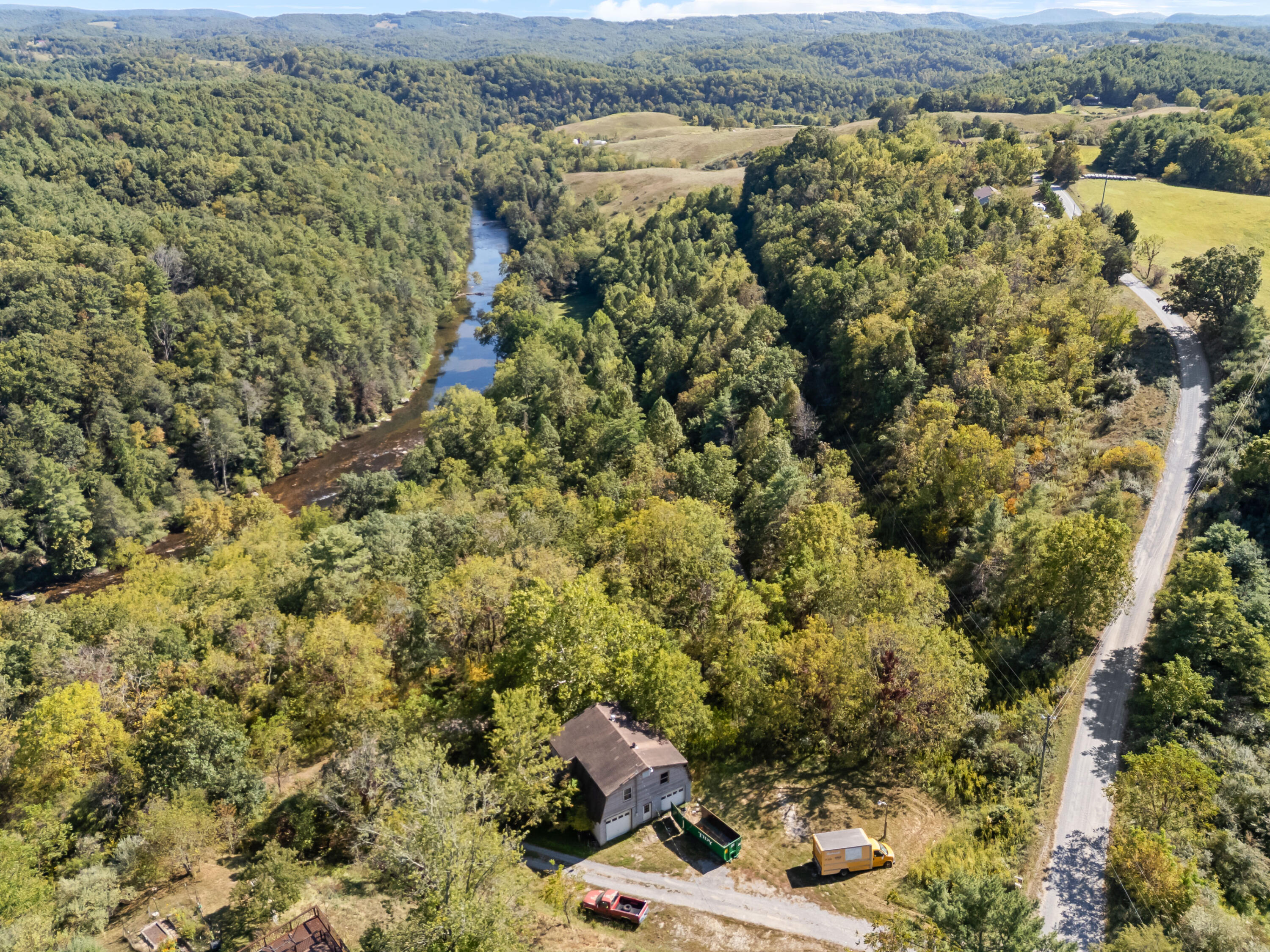 6286 Chestnut Ridge Road Riner, VA 24149 - Photo 54 of 102 an aerial view of residential houses with outdoor space
