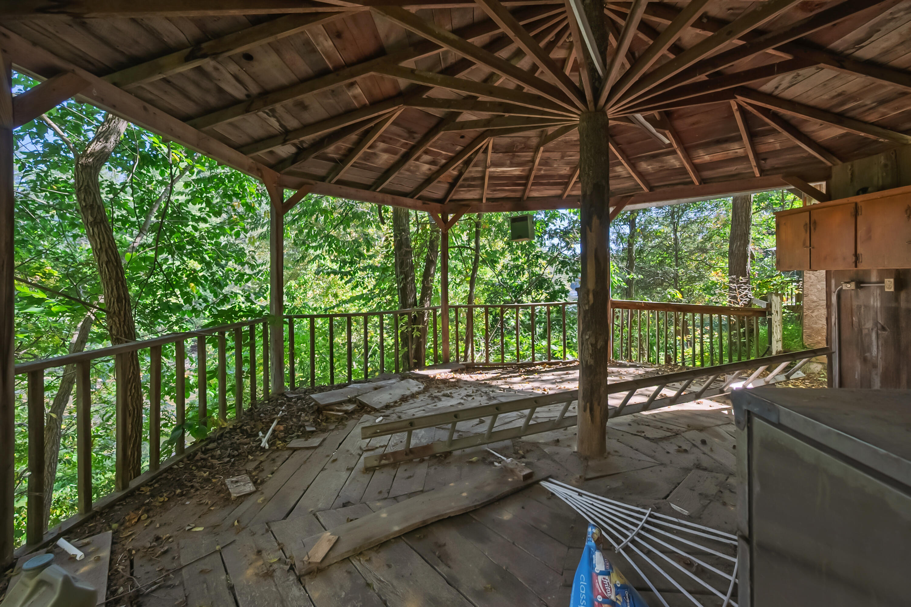 6286 Chestnut Ridge Road Riner, VA 24149 - Photo 59 of 102 a view of a backyard with floor to ceiling window and wooden floor