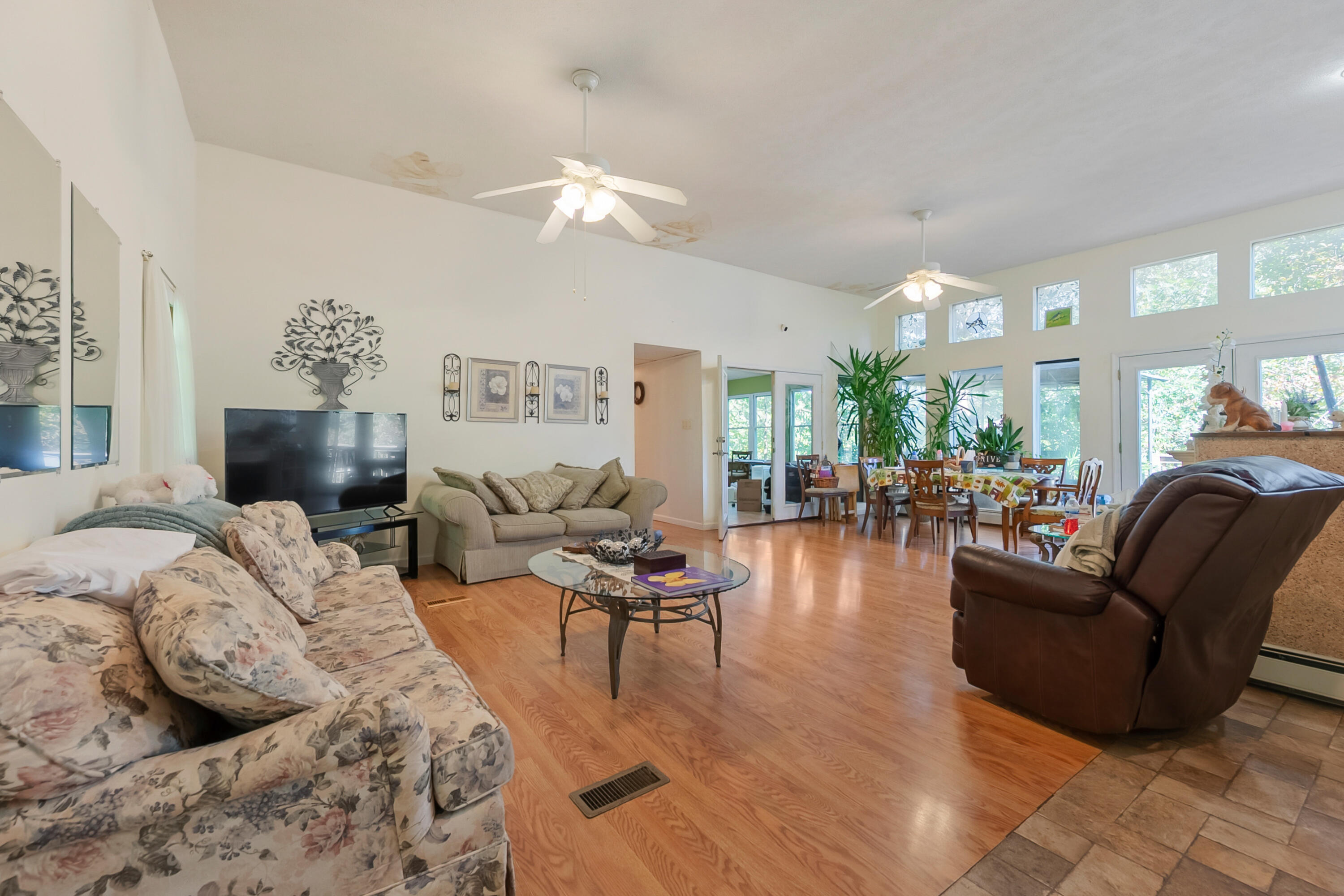 6286 Chestnut Ridge Road Riner, VA 24149 - Photo 8 of 102 a living room with furniture and a large mirror